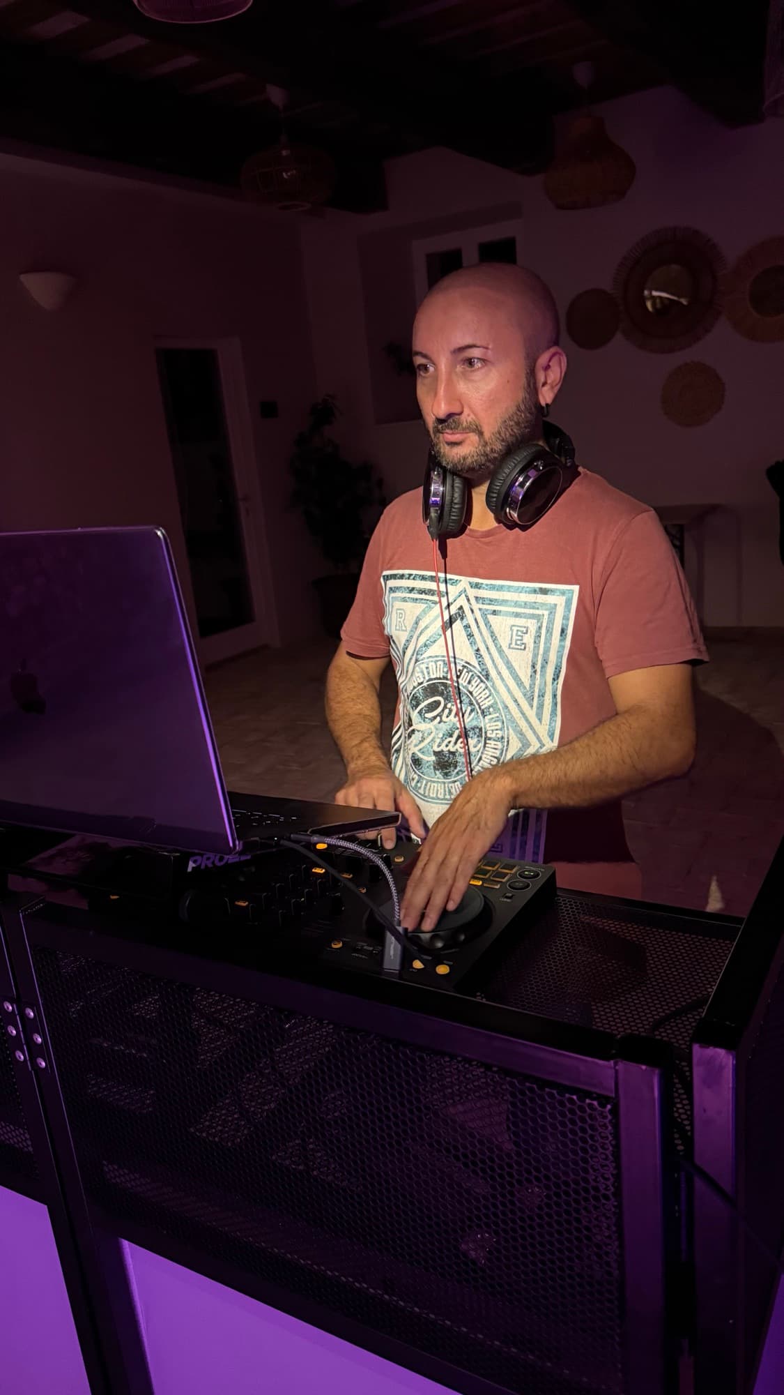 DJ Tonex at the console